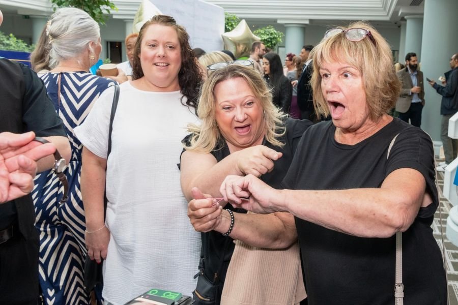 A pickpocket working a corporate crowd