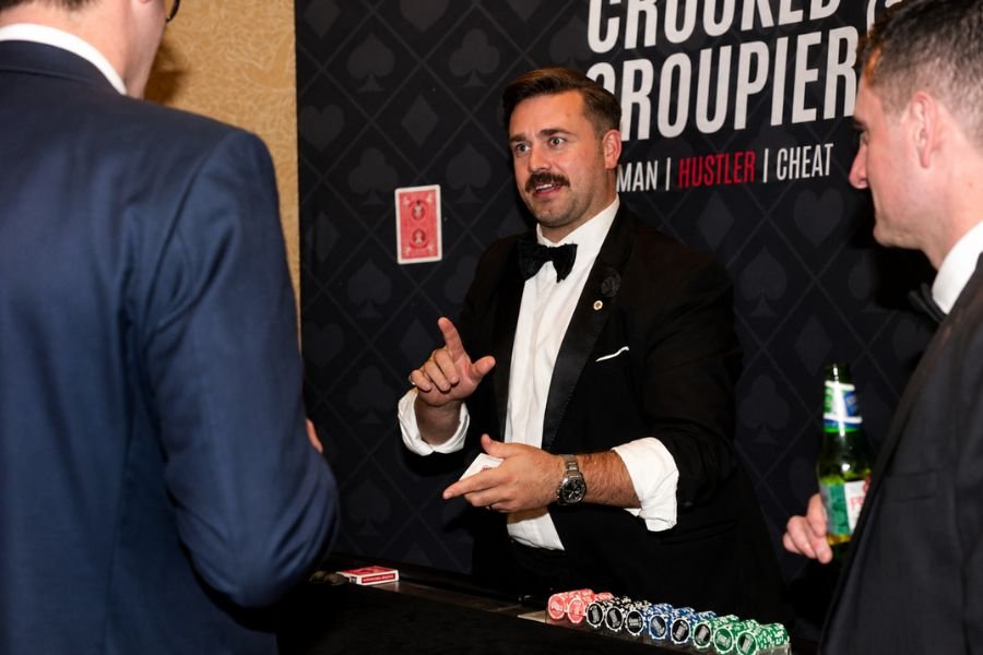 A guest amazed by a card reveal